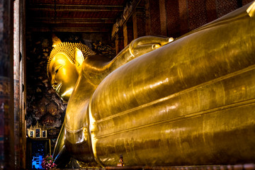 Giant Reclining Buddha inside Wat Pho Temple in Bangkok