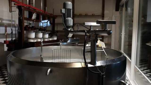 Cheese milk stirring machine. Cheese production on a farm in Zaandam, Holland, Netherlands 03.18.201