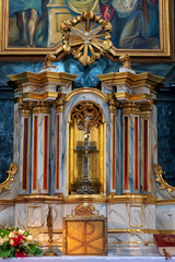 Fototapeta na wymiar Beautiful richly decorated interior of the church in europe