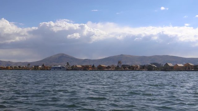 Travelling by ship from Puno to the Uros Islands on Lake Titicaca, Peru, South America