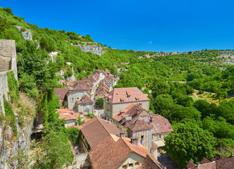 Fototapeta na wymiar Landscape view of the main street of the medieval french village of Rocamadour, Lot Department, Quercy, Occitanie Region, France. UNESCO world heritage site.
