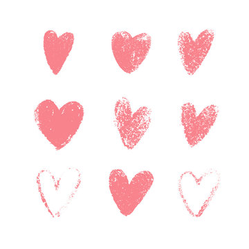 Pink hand drawn grunge hearts isolated on white background. Set of love symbols in the shape of heart. Vector illustration for your graphic design