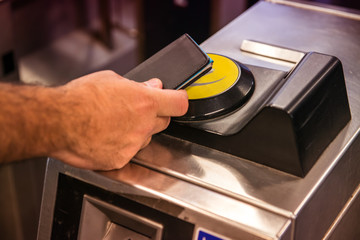 Entry turnstile with London pass.