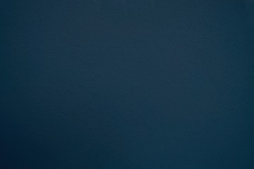 Texture of Dark Blue Stucco Wall Background