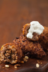 Traditional arabic kibbeh with lamb and pine nuts.