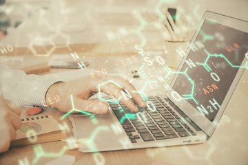 Science formula hologram with man working on computer on background. Education concept. Double...