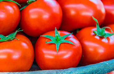 Fresh organic tomatoes on the street stall