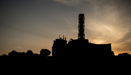 Obraz premium Creative artwork decoration. Chernobyl nuclear power plant at night. Layout of abandoned Chernobyl station after nuclear reactor explosion.