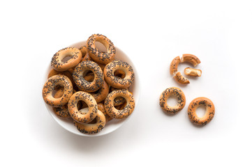 Poppy bagels isolated on white background. Top view. 