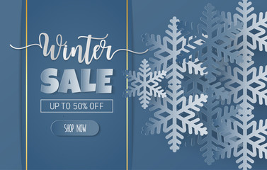 Paper cut style with winter sale banner with blue and white snowflakes on blue background
