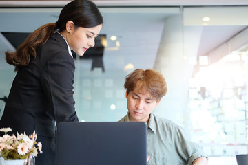 Business working in office with documents and laptop people Consulting and business planning.