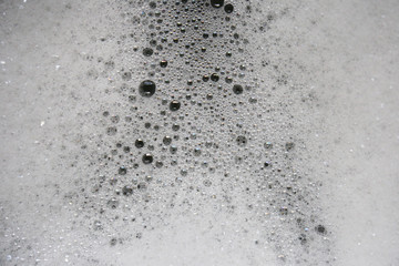 bubble and soapsuds on black background, bubble background