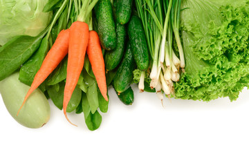 Fresh green vegetables and herbs isolated on white background. Space for text or design.