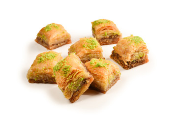 Pistachio baklava on a white background. Dessert.