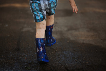 child and puddle