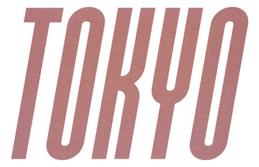 TOKYO word with terracotta colored fabric texture on white background