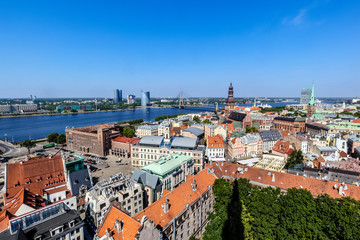 Fototapeta na wymiar View over the old town of Riga, Latvia, to the Daugava river. Shot from the bell tower of St. Peter.