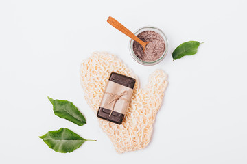 Flat lay composition of massage mitten
