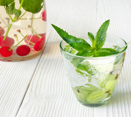 Fresh cool drink of ripe juicy cherry and gooseberry berries
