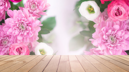 Delicate background of flowers peony. Blurred floral background. Wooden old table on the background of a blooming bouquet