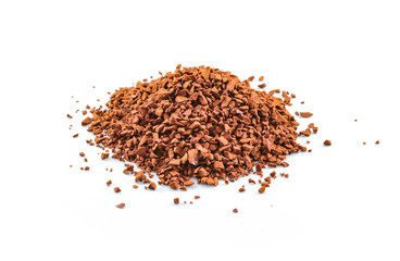 Coffee powder burst on white background