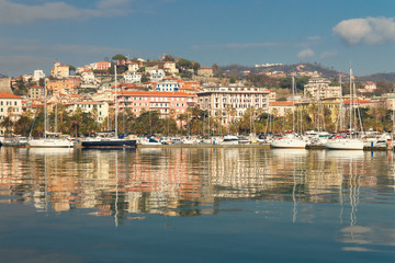 Fototapeta na wymiar Bay with yachts and embankment of the city of La Spezia in Italy
