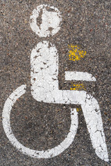 Wheelchair Handicap Sign asphalt road