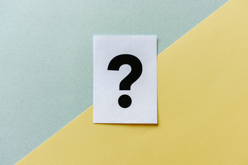 Question mark on diagonal yellow grey background