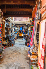 Street of Marrakech market with traditional souvenirs, Morocco