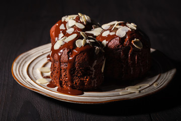 chocolate muffins on a wooden background