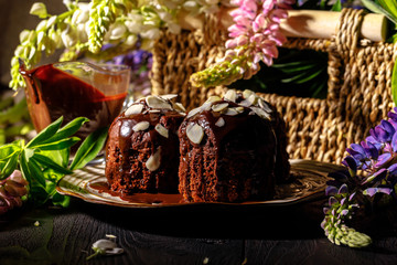 delicious chocolate muffins on dark background, selective focus