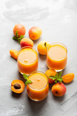 Fresh apricot juice on the marble table