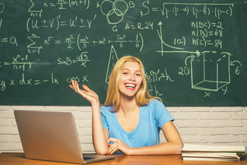Student preparing for college exams. Student. Educational process. Student working on laptop in college.