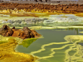 In the Danakilian depression of various fumaroles, steam emerges and water flows out. Ethiopia