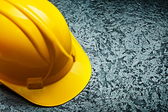 cloae up view yellow helmet on black background