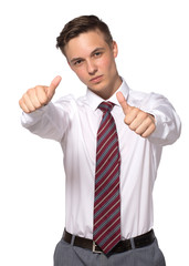Handsome young businessman shows thumbs gesture isolated on white