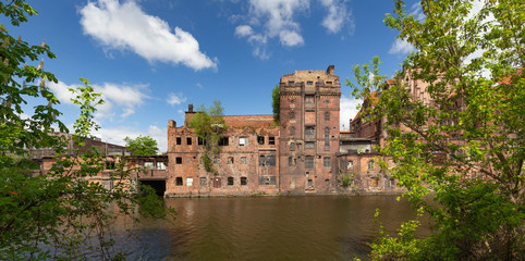 Fototapeta na wymiar Szczecin. Old factories on the Odra River in the historic part of the city