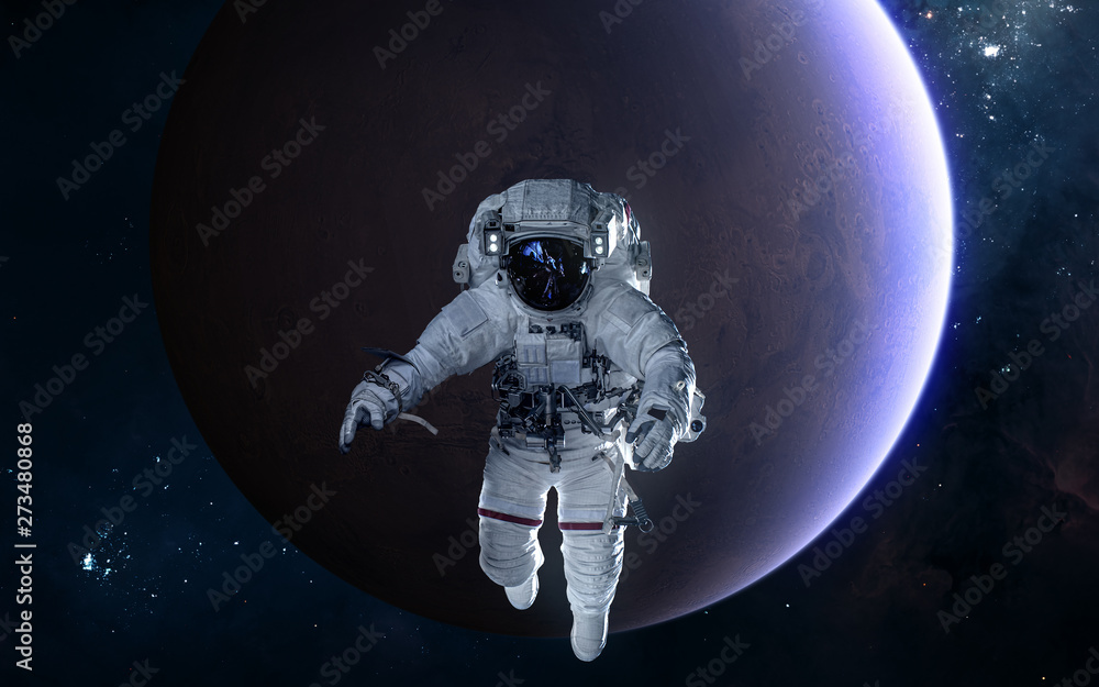 Canvas Prints astronaut on background of mars. solar system. science fiction. elements of this image furnished by 