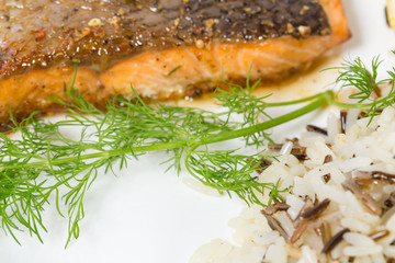Griiled salmon fillet with basmati rice.