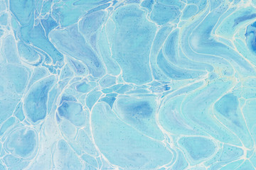 Obraz premium Beautiful background of liquid acrylic in blue and white on canvas