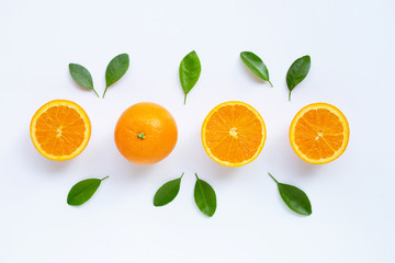 Fresh orange citrus fruit with leaves isolated on white background.