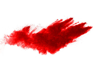 Freeze motion of red powder exploding, isolated on white background. Abstract design of red dust cloud. 