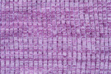 Closeup abstract pattern at purple women's clothing textured background