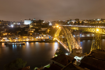 Fototapeta na wymiar Famos Porto Bridge during the night time. Porto, Portugal