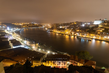 Fototapeta na wymiar Incredible night views of Porto, Portugal during cold autumn evening 2018