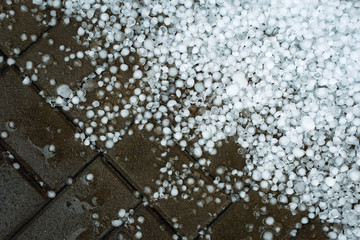 ice hail on concrete pavement
