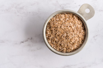 Wheat Bran in a Measuring Cup