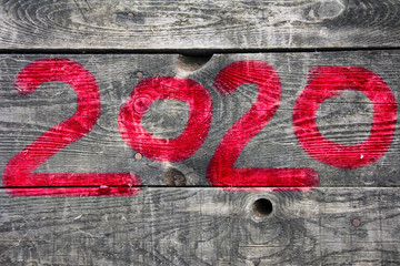 2020 number made on wooden boards with red paint