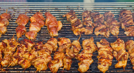 Lamb skewers on a grill rack, food