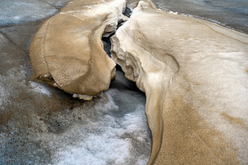 Summer sun melting ice on the Athabasca Glacier in the Jasper National Park, Alberta, Canada